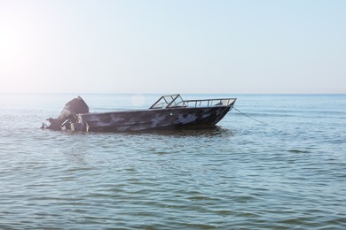 Photo of Motor boat at sea on sunny day