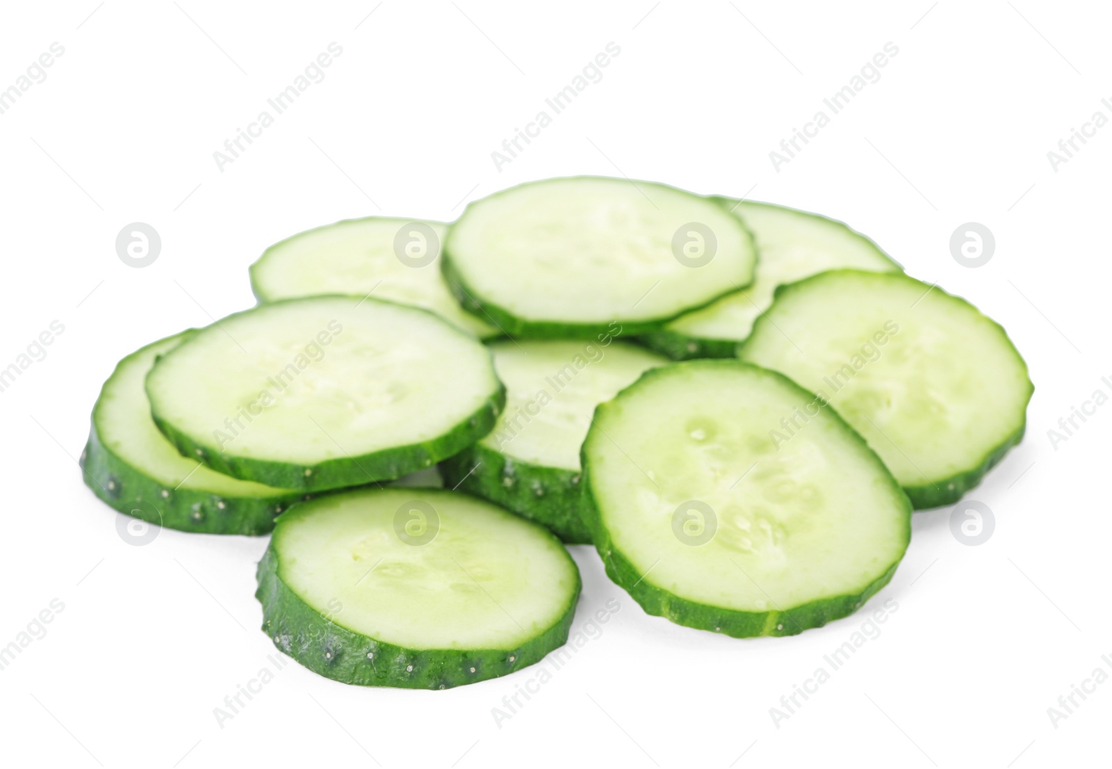 Photo of Slices of fresh cucumber on white background