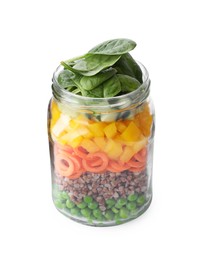 Photo of Healthy salad in glass jar isolated on white