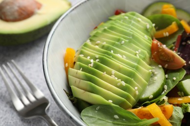 Healthy dish high in vegetable fats on light table, closeup