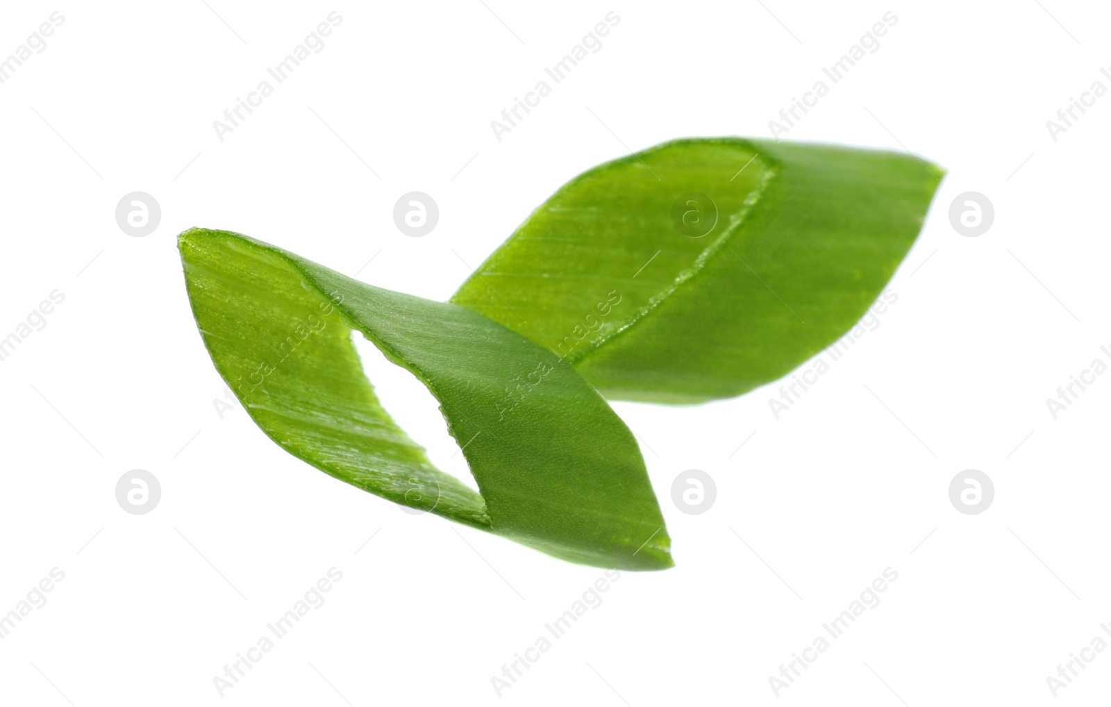 Photo of Pieces of fresh green onion isolated on white