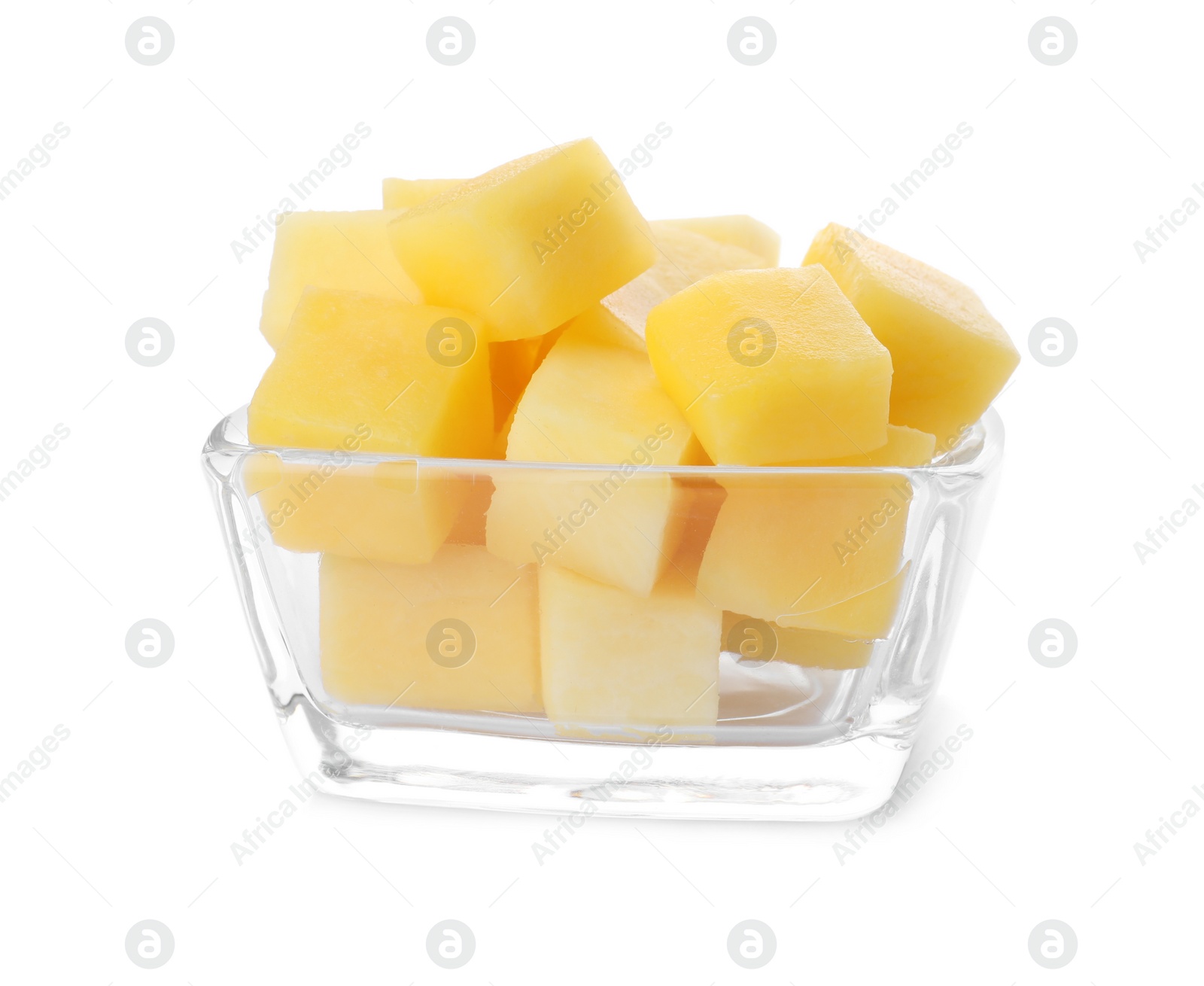 Photo of Tasty mango cubes in glass bowl isolated on white