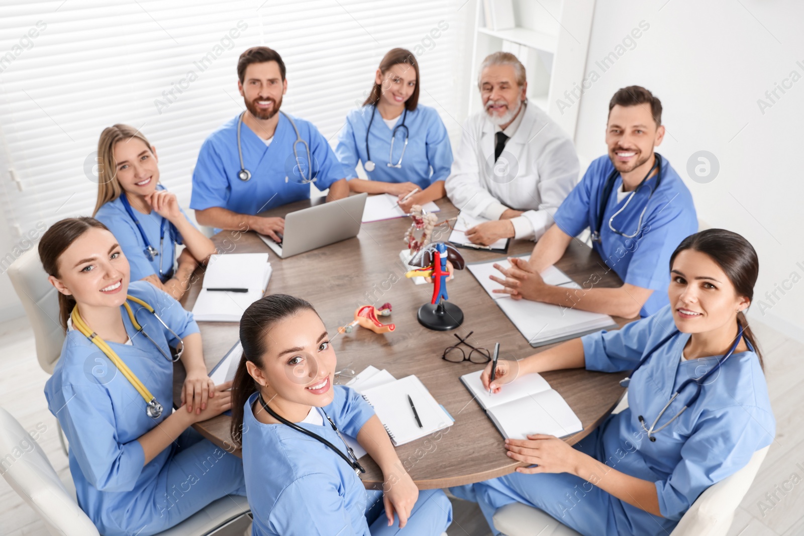 Photo of Doctor and interns on lecture in university, above view