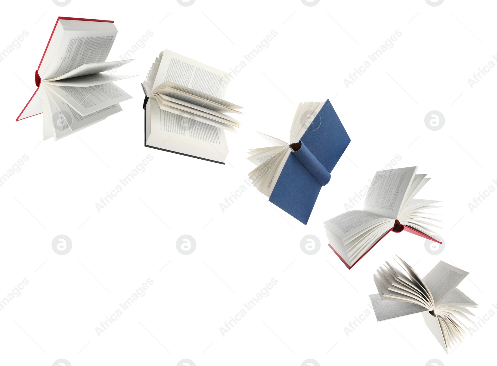 Image of Many hardcover books flying on white background