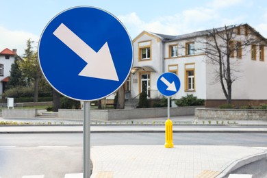 Traffic sign Keep Right on city street, space for text