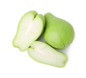 Photo of Cut and whole chayote isolated on white, top view
