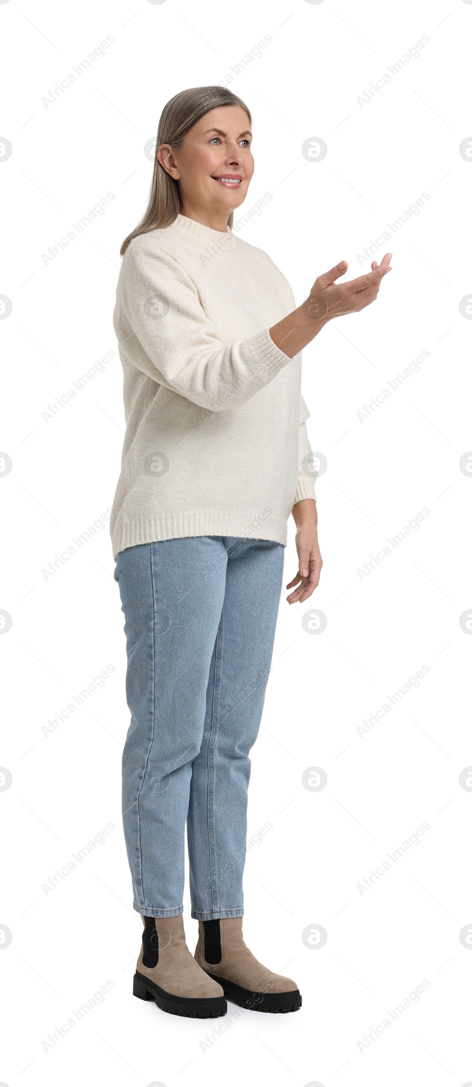 Photo of Full length portrait of senior woman on white background