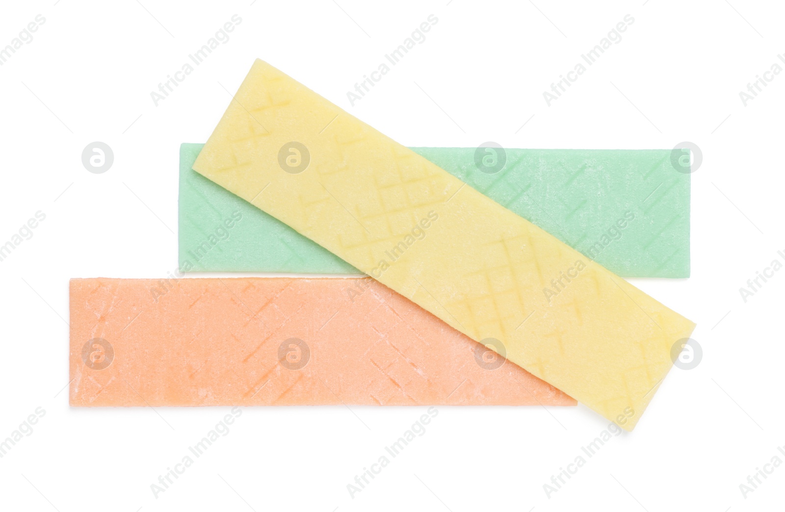 Photo of Sticks of tasty bubble gums isolated on white, top view