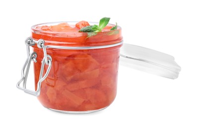 Jar of tasty persimmon jam and mint isolated on white