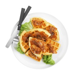 Plate with tasty Belgian waffles, bacon, lettuce and cutlery isolated on white, top view