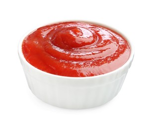 Photo of Tasty ketchup in bowl isolated on white. Tomato sauce