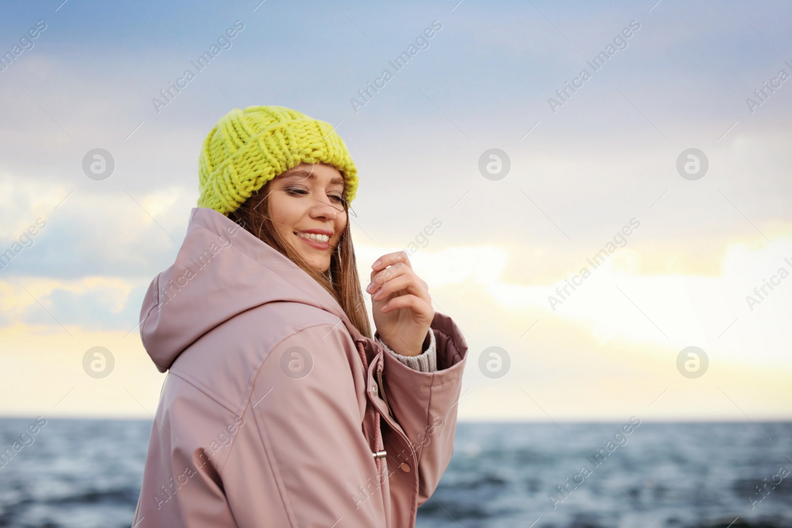 Photo of Portrait of beautiful young woman near sea