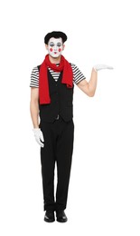 Funny mime artist in beret posing on white background