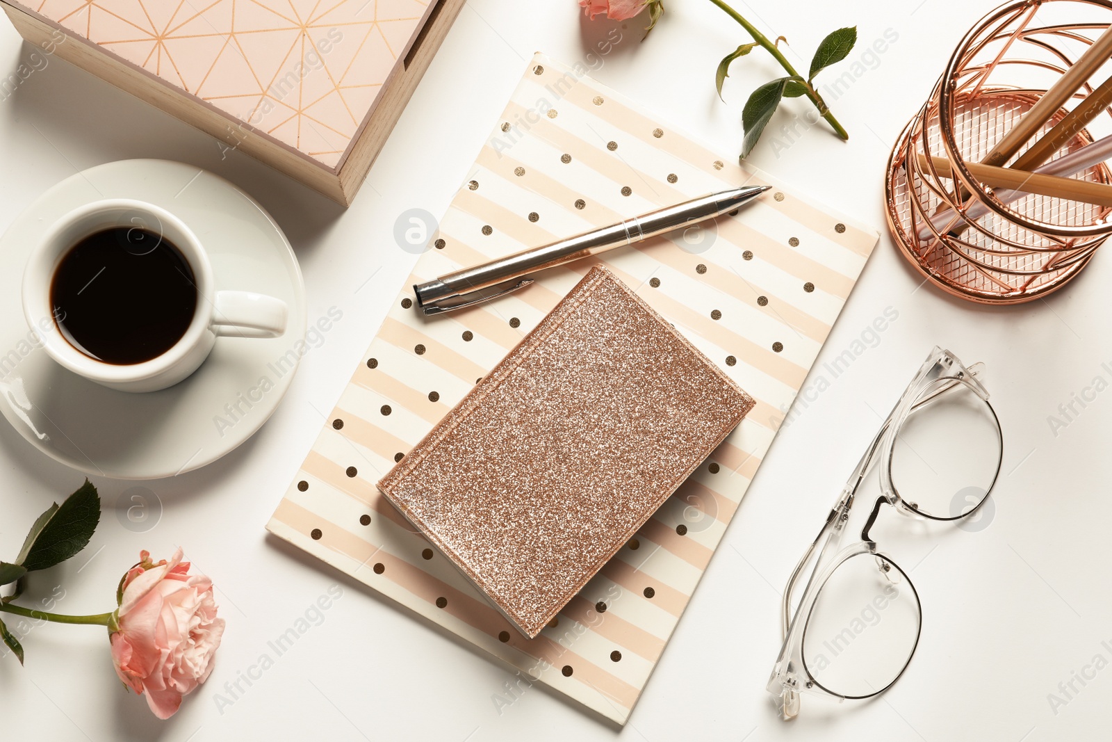 Photo of Flat lay composition with notebooks, cup of coffee and stationery on white background