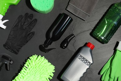 Photo of Flat lay composition with car cleaning products on grey table