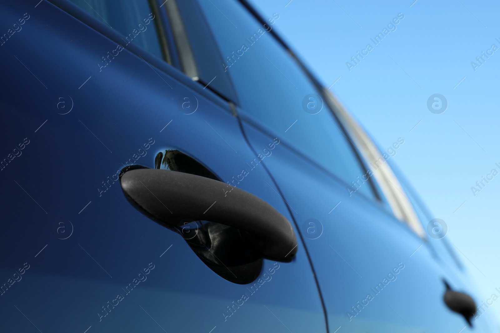 Photo of Car with door handle outdoors, closeup view