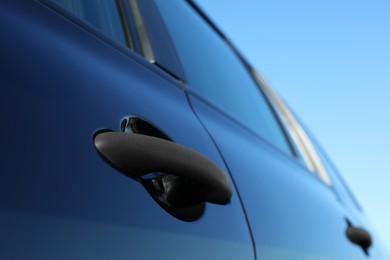 Photo of Car with door handle outdoors, closeup view