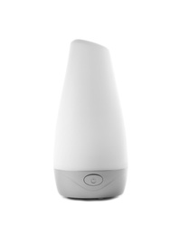 Photo of New modern aroma humidifier on white background