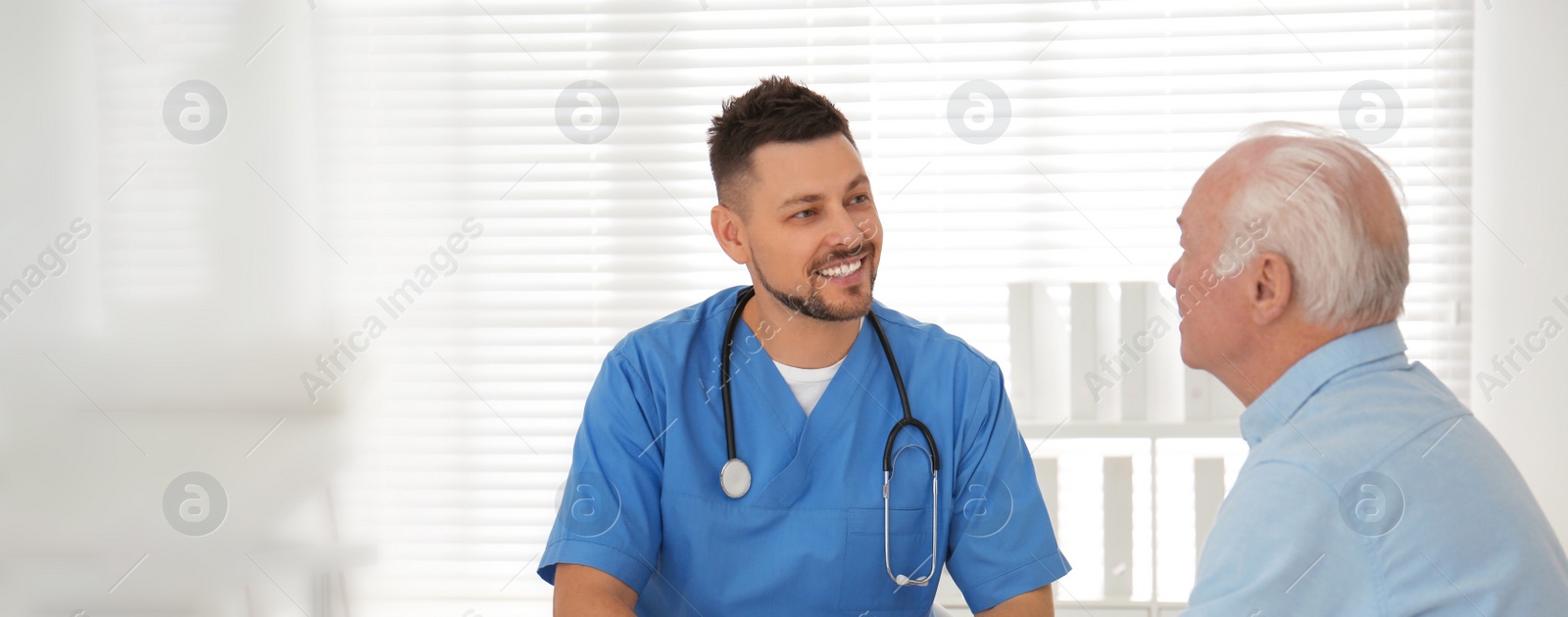 Image of Doctor examining senior patient in modern office, space for text. Banner design