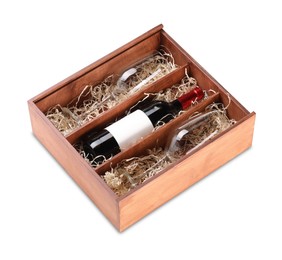 Photo of Wooden gift box, wine and glasses isolated on white, above view