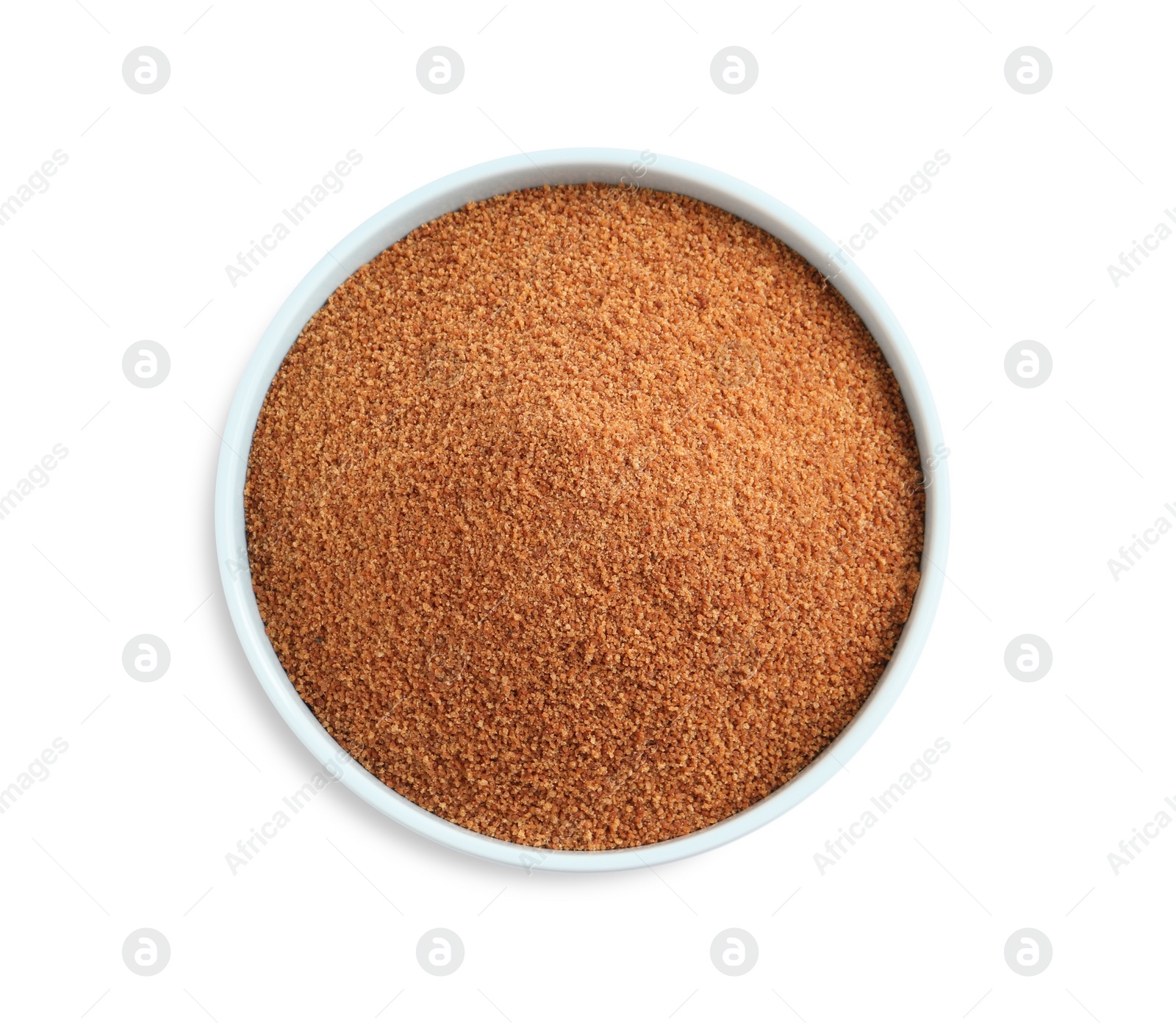 Photo of Natural coconut sugar in bowl isolated on white, top view