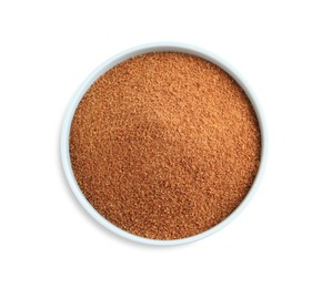 Natural coconut sugar in bowl isolated on white, top view