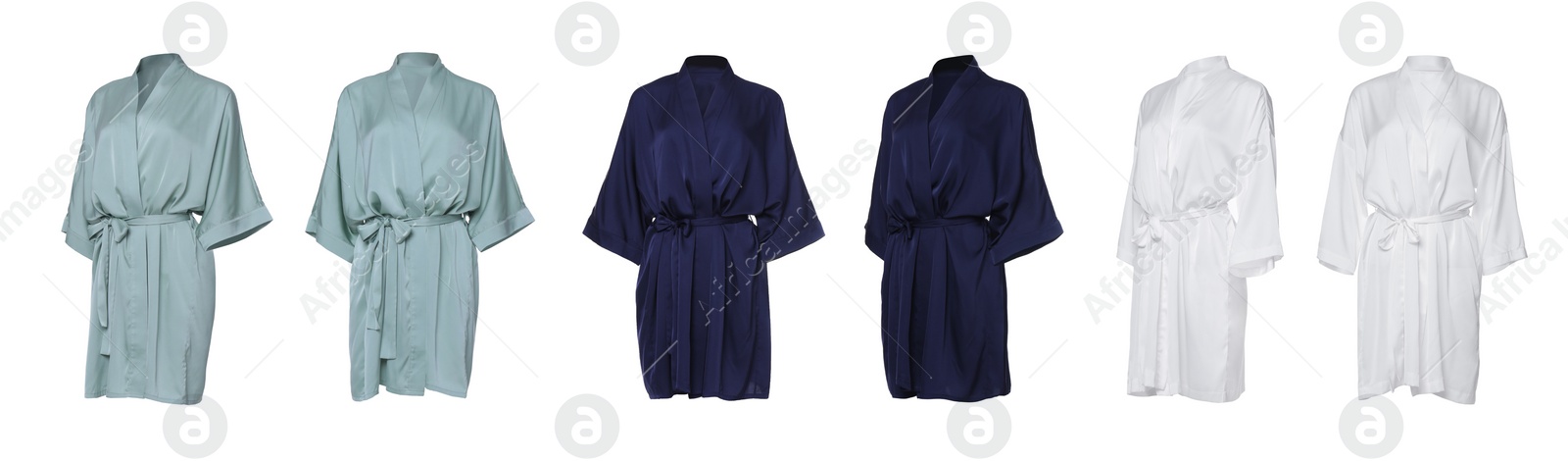 Image of Set of different color silk bathrobes on white background