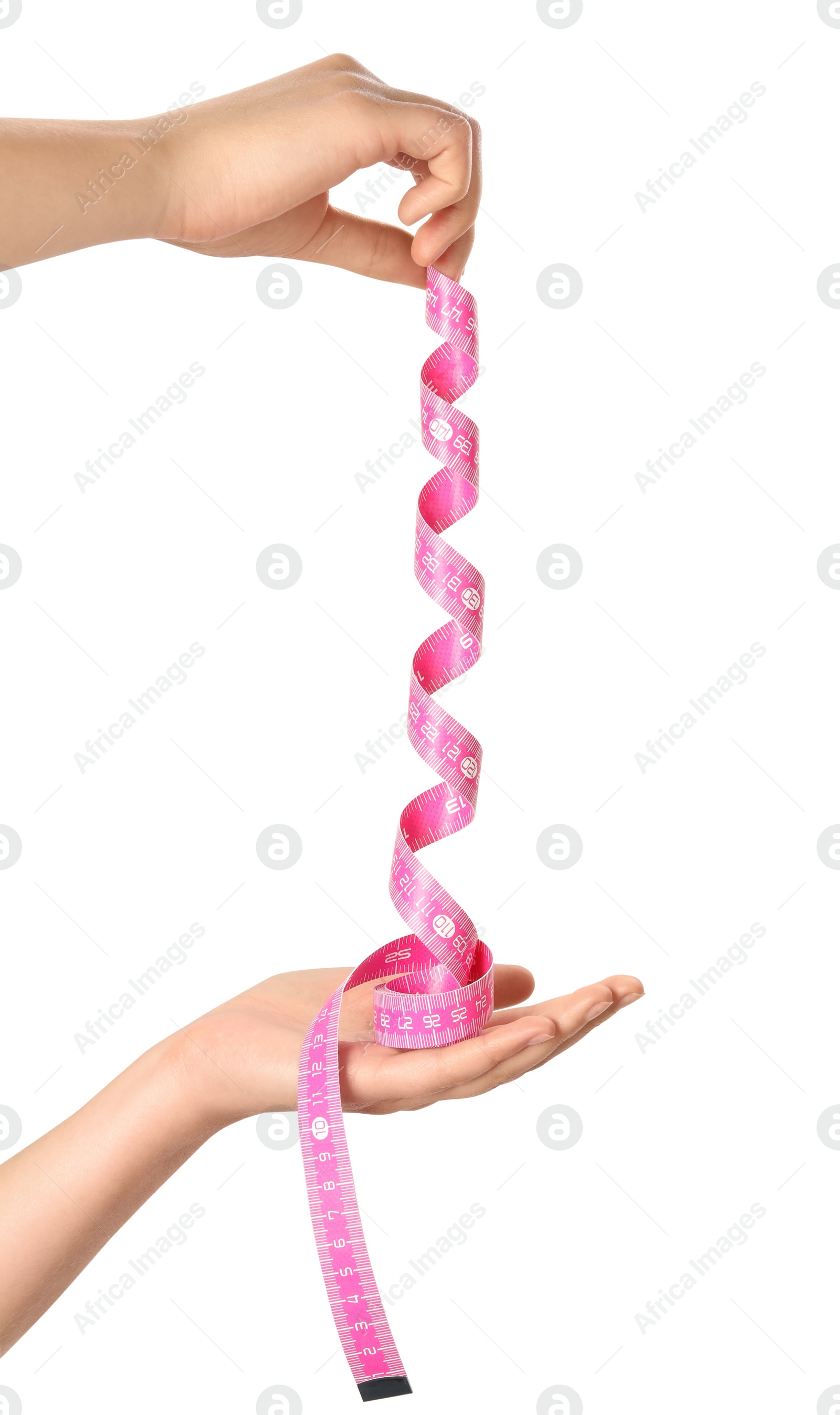 Photo of Woman holding pink measuring tape on white background, closeup