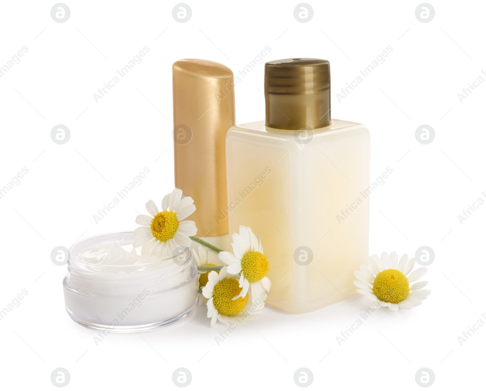 Photo of Set of different cosmetic products and chamomile flowers on white background