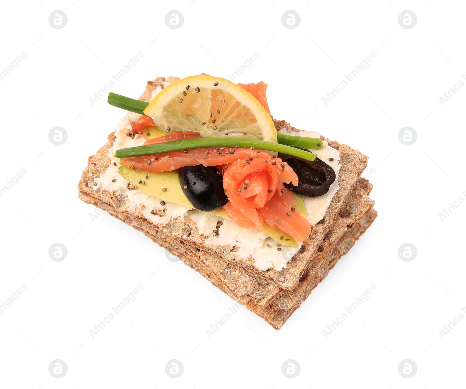 Photo of Fresh crunchy crispbreads with cream cheese, salmon, olives, lemon and green onion on white background, above view