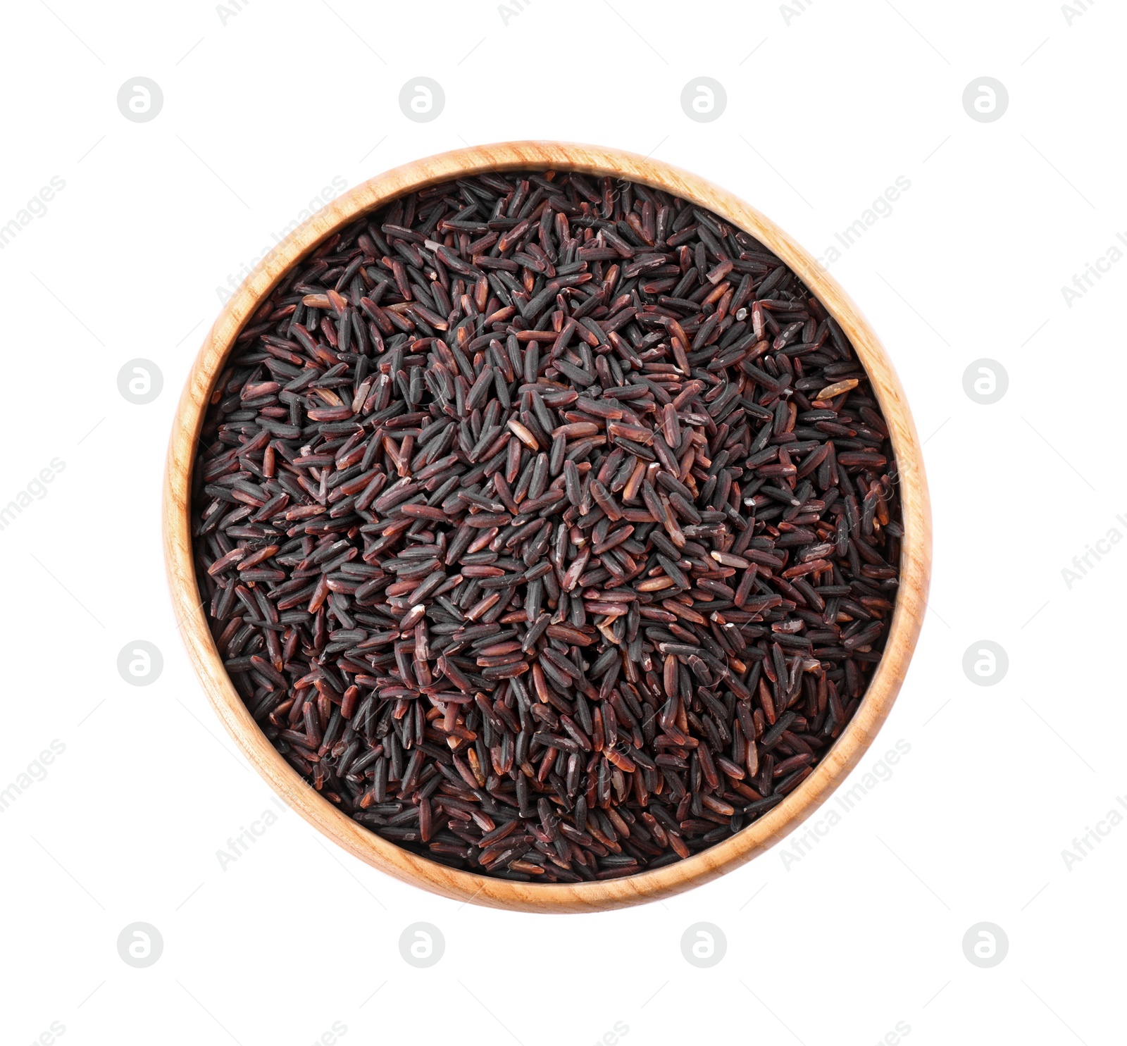 Photo of Brown rice in wooden bowl isolated on white, top view