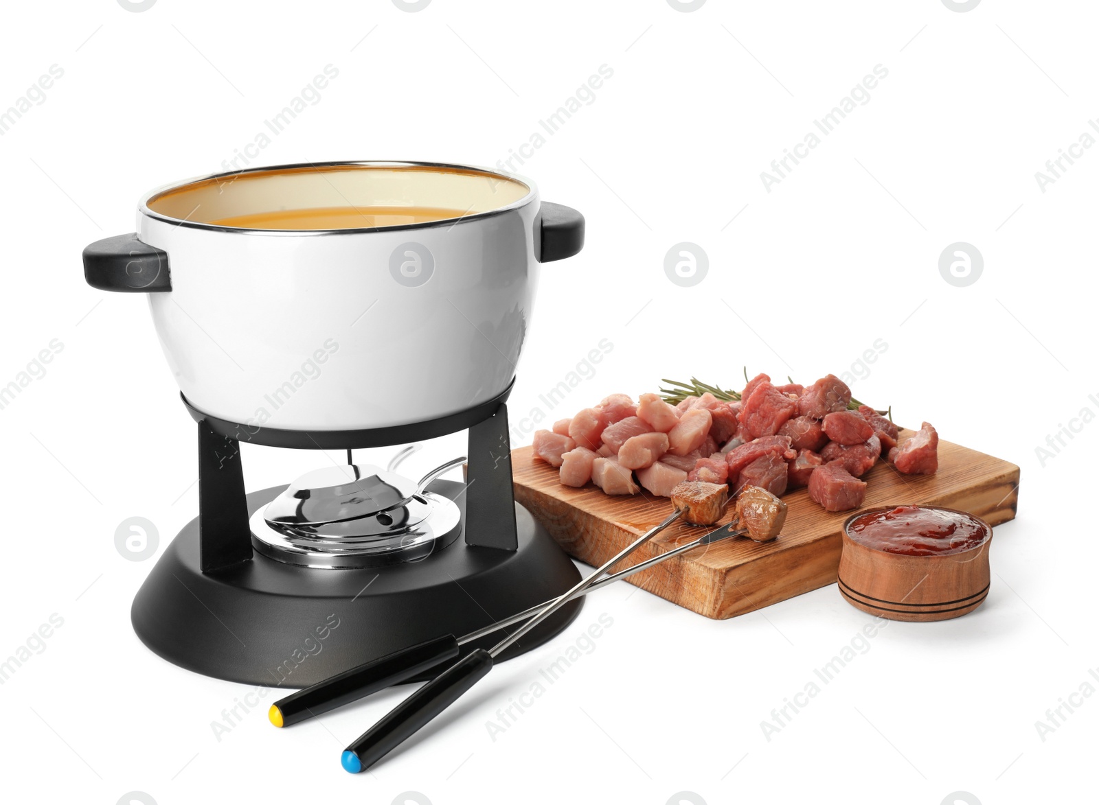 Photo of Composition with fondue pot and meat on white background