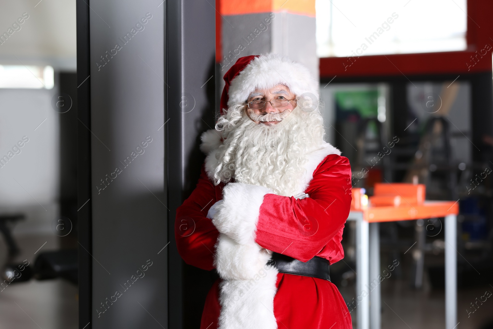 Photo of Authentic Santa Claus in modern gym