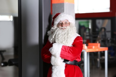 Authentic Santa Claus in modern gym