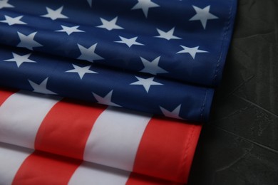 Photo of Flag of USA on black table, closeup