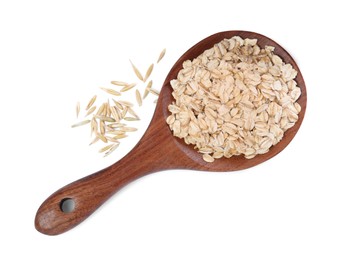 Photo of Raw oatmeal and wooden spoon on white background, top view