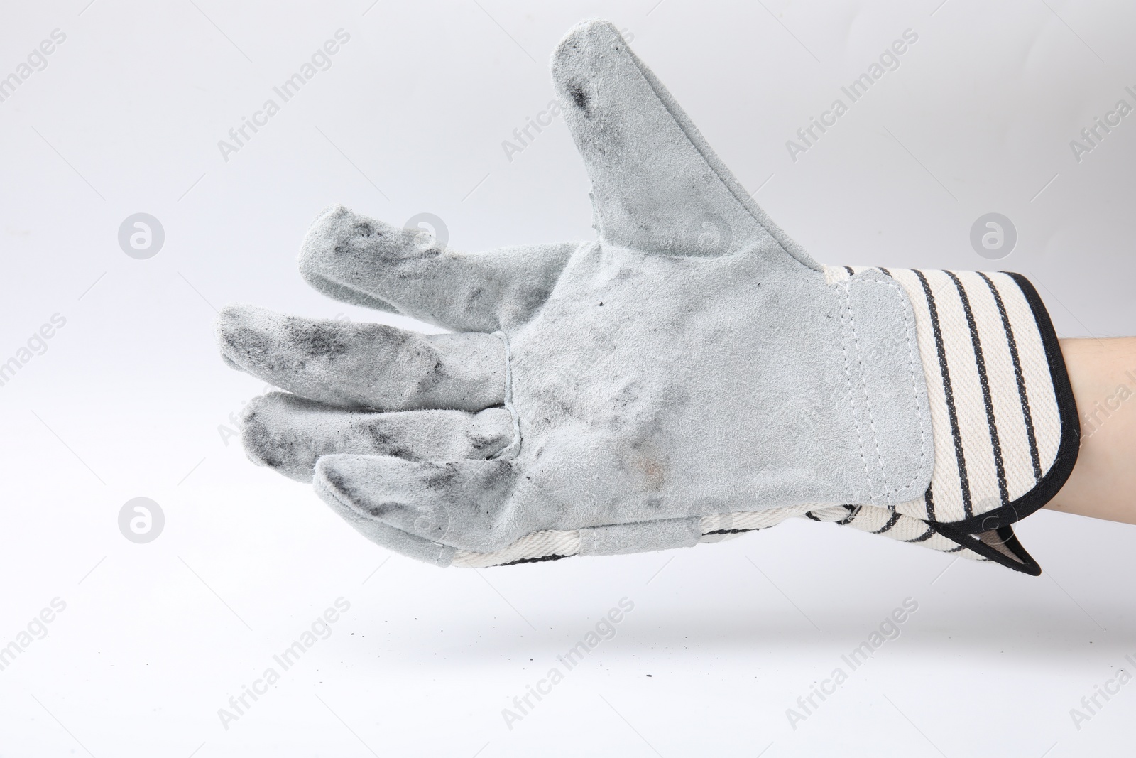 Photo of Woman in gardening glove on white background, closeup