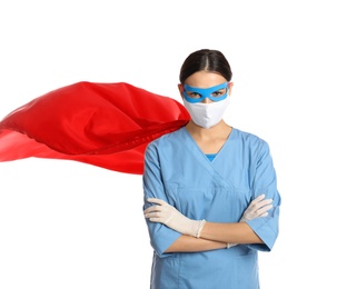 Photo of Doctor dressed as superhero posing on white background. Concept of medical workers fighting with COVID-19
