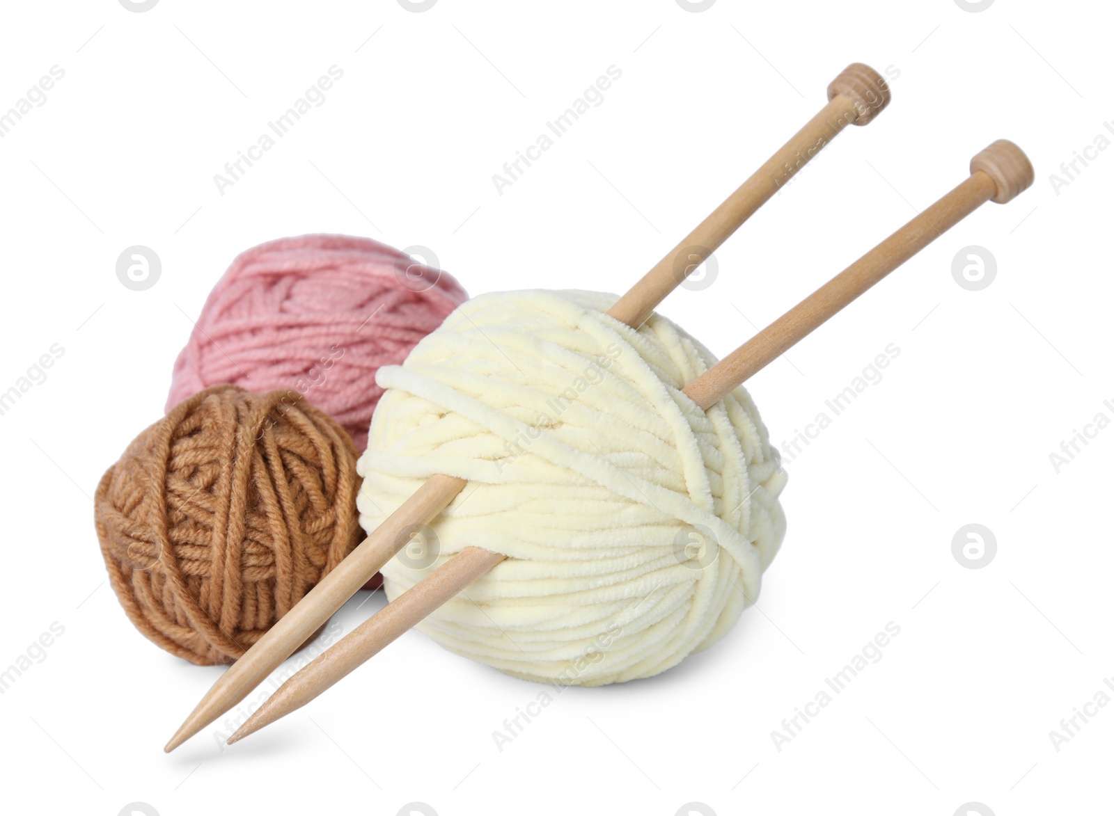 Photo of Soft woolen yarns and knitting needles on white background