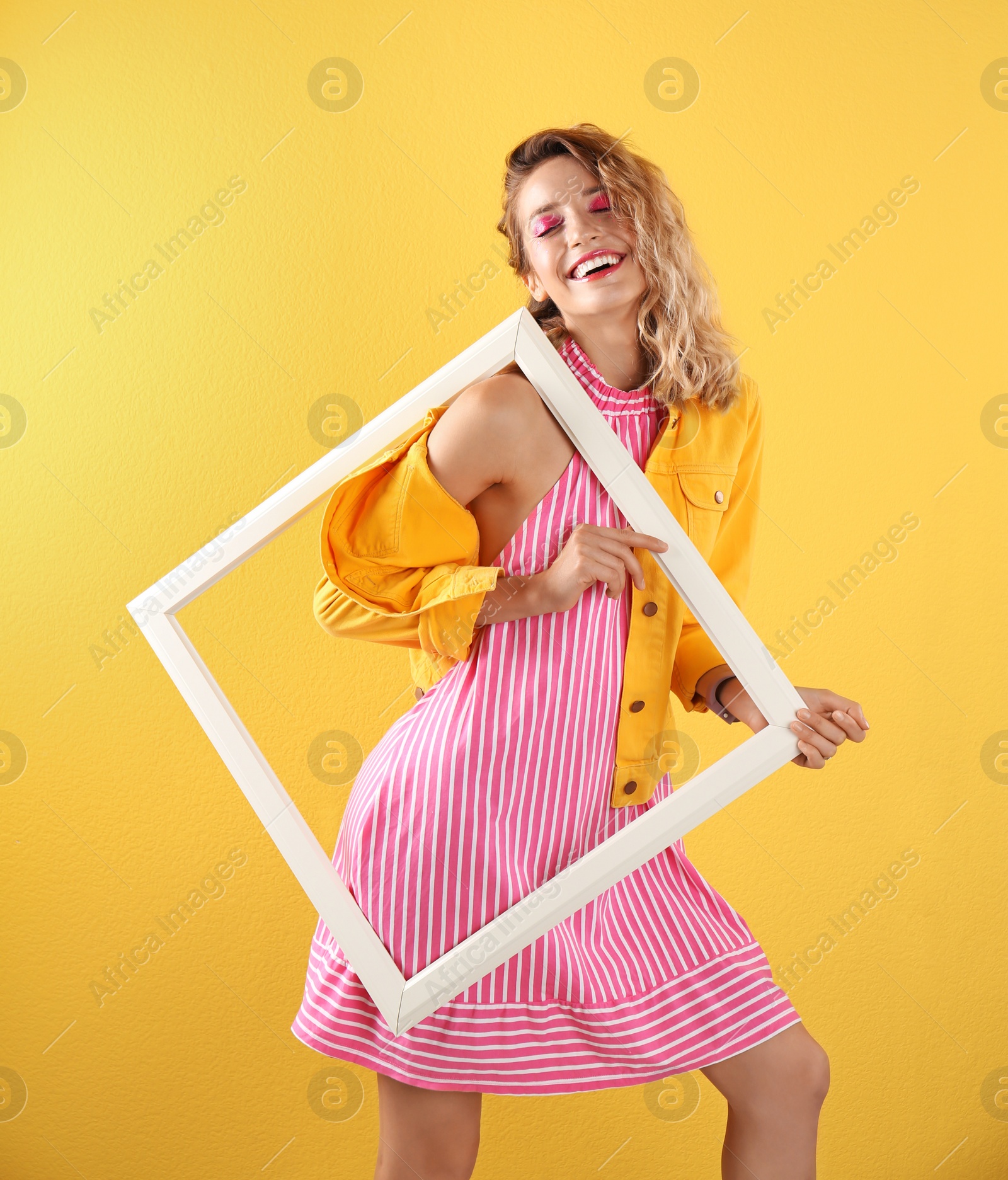 Photo of Beautiful young woman posing on color background. Summer fashion