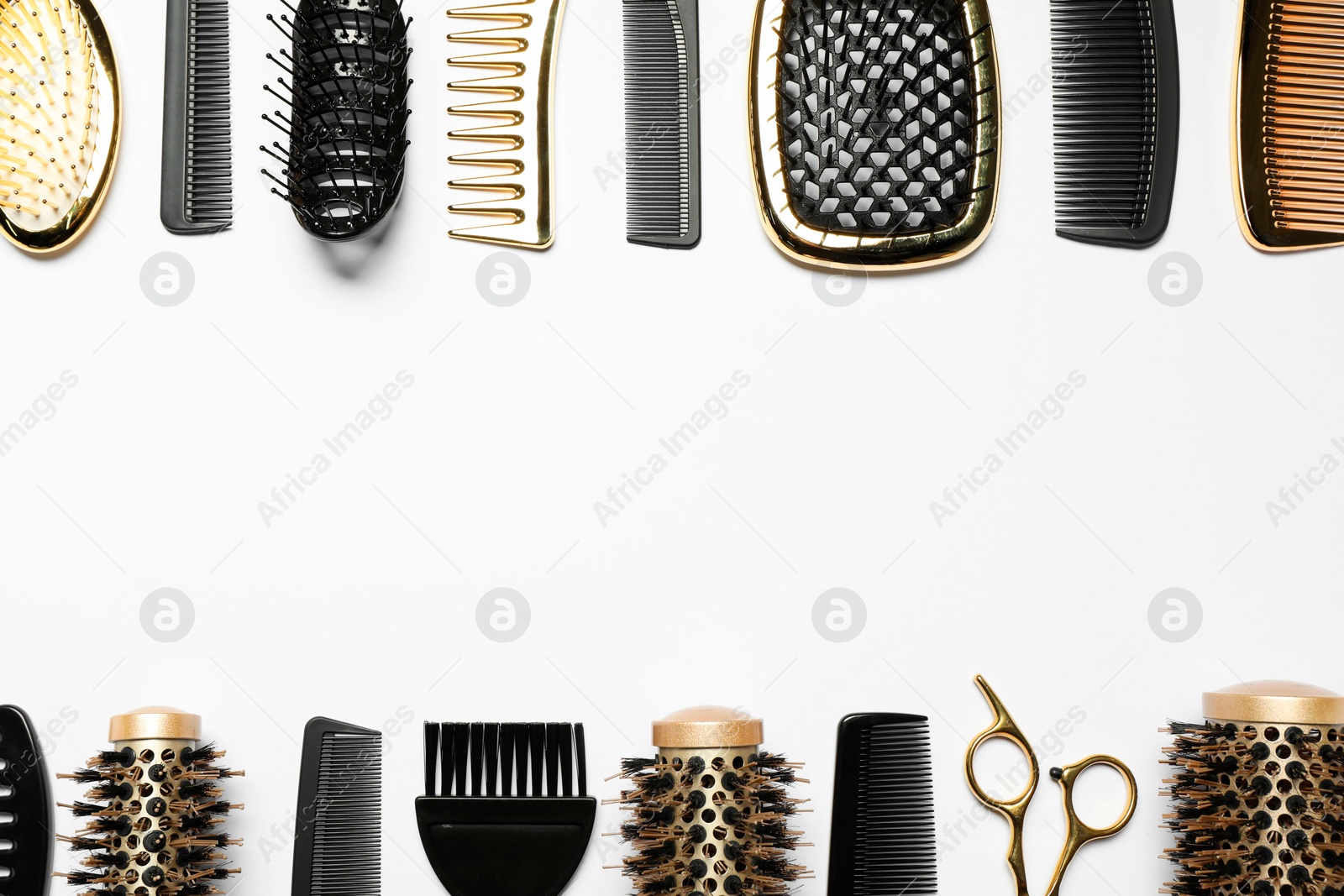 Photo of Hairdressing tools on white background, flat lay. Space for text