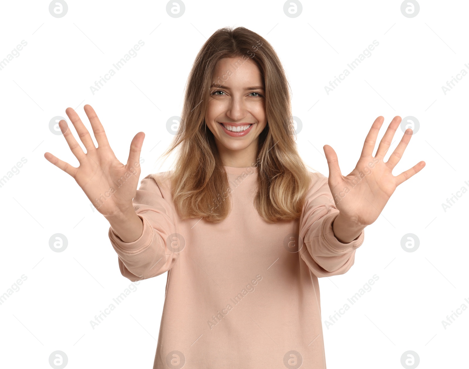Photo of Woman showing number ten with her hands on white background