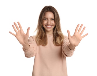 Woman showing number ten with her hands on white background