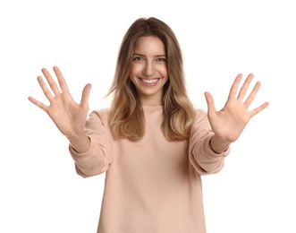 Photo of Woman showing number ten with her hands on white background