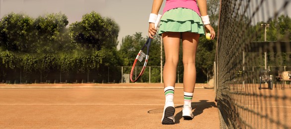 Sportswoman playing tennis at court on sunny day, closeup. Banner design with space for text