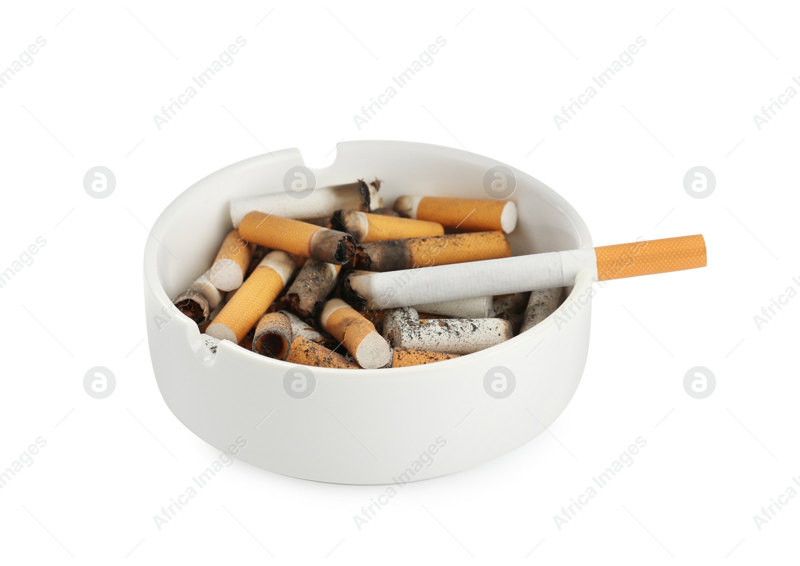 Photo of Ceramic ashtray with cigarette stubs isolated on white