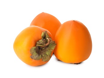 Delicious ripe juicy persimmons on white background