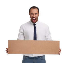 Angry man holding blank cardboard banner on white background, space for text