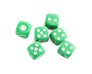 Photo of Many green game dices isolated on white, above view