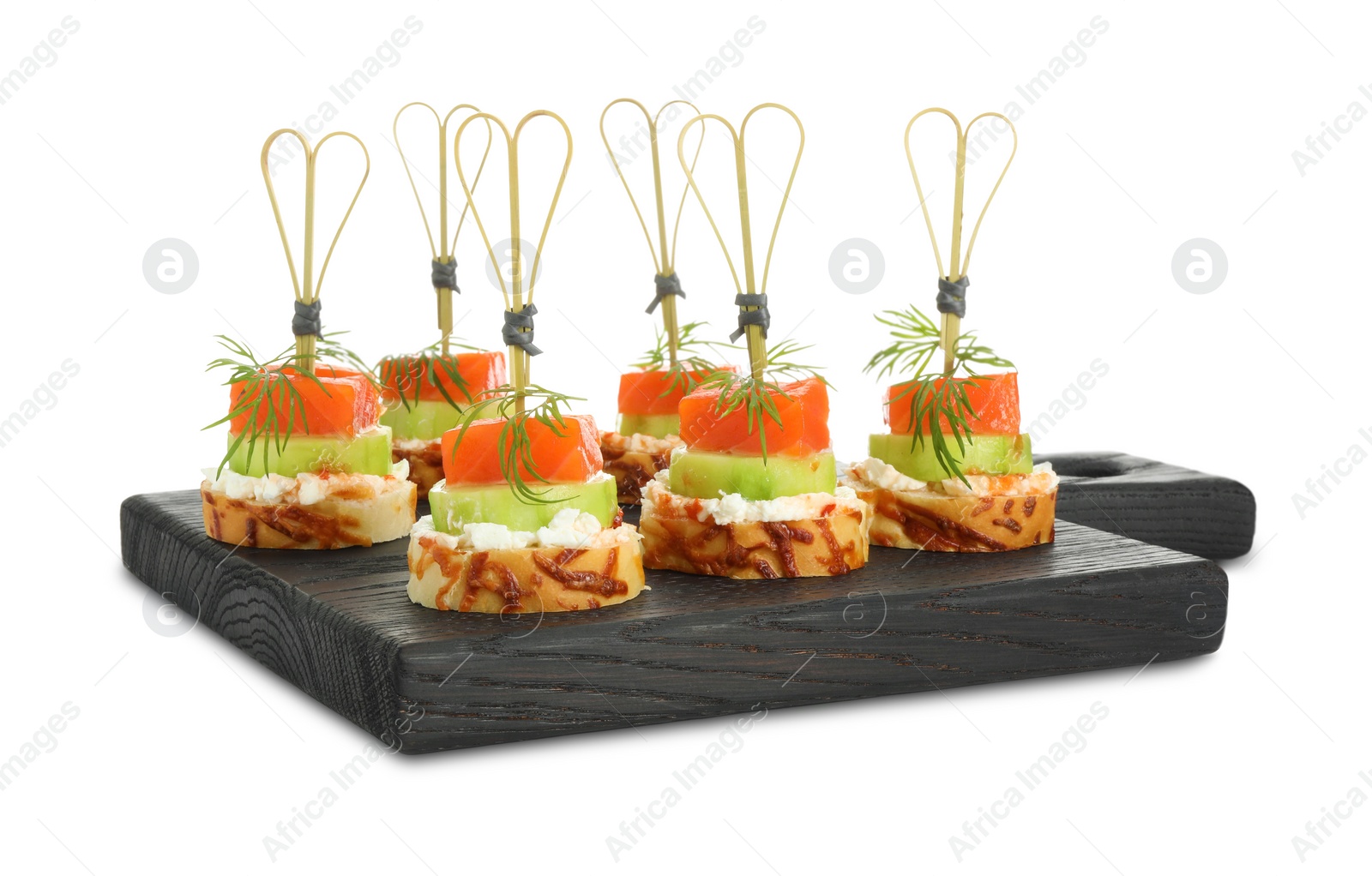 Photo of Tasty canapes with salmon, cucumber, bread and cream cheese isolated on white